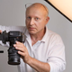 Illustration for article titled Stock-Photo Model Scout Sees Something Special In Man In Business Suit Crossing Arms